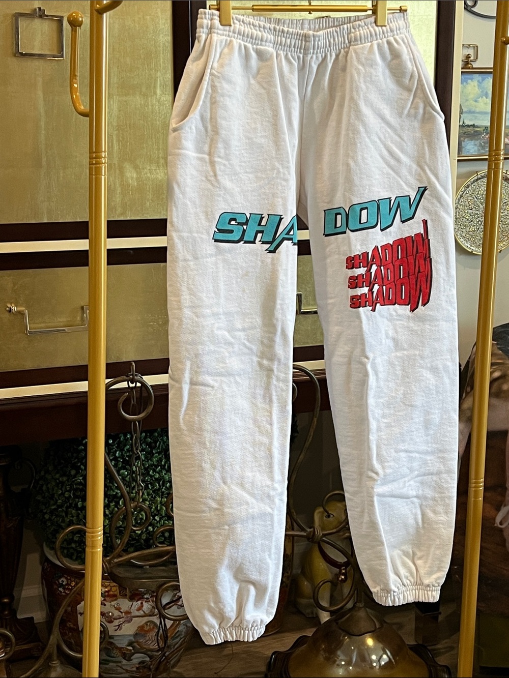 Shadow Hill White Track Pants with Teal and Red Graphics